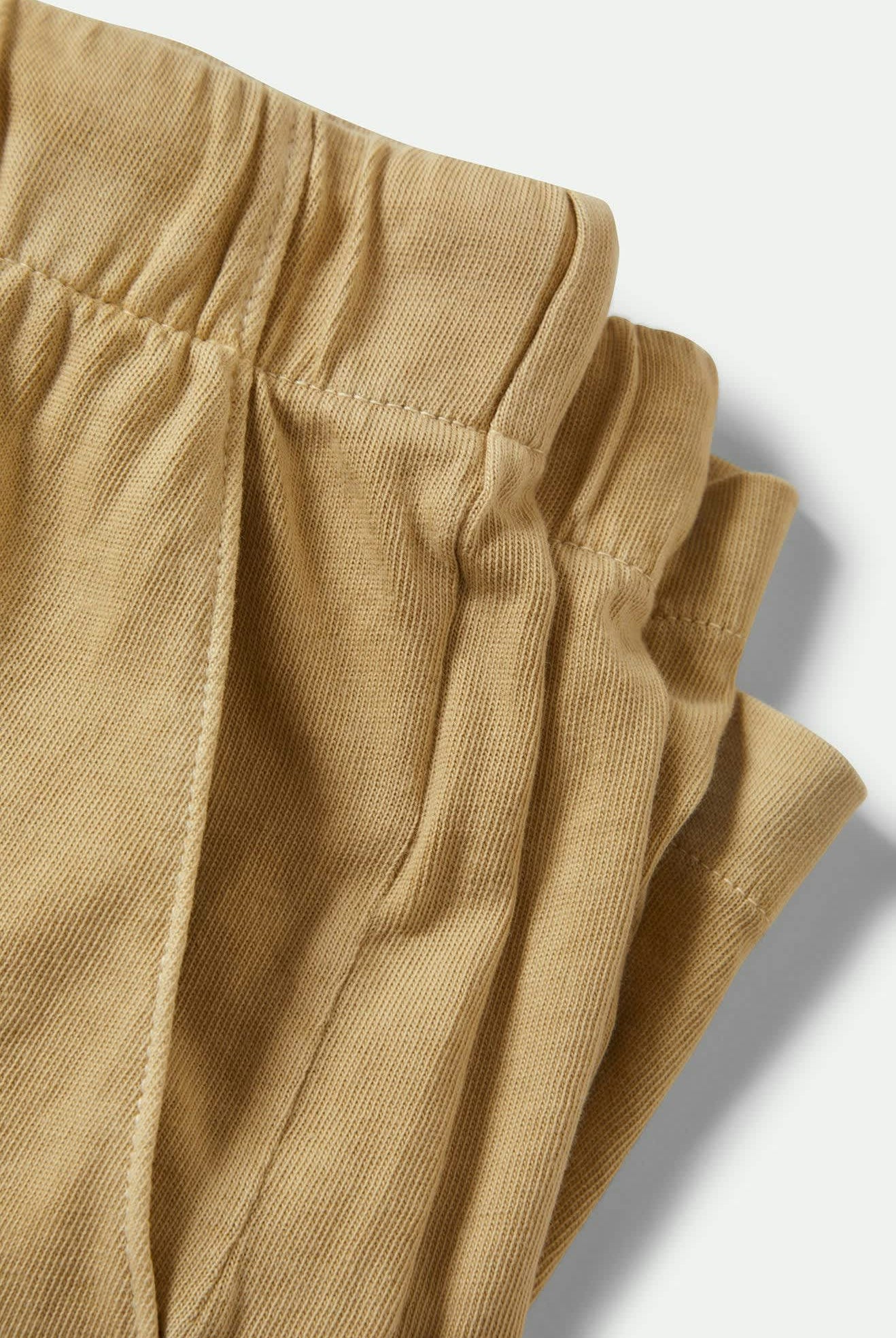 Women's Carefree Organic Garment Dyed Lounge Short in the color Pale Khaki - Additional Laydown image