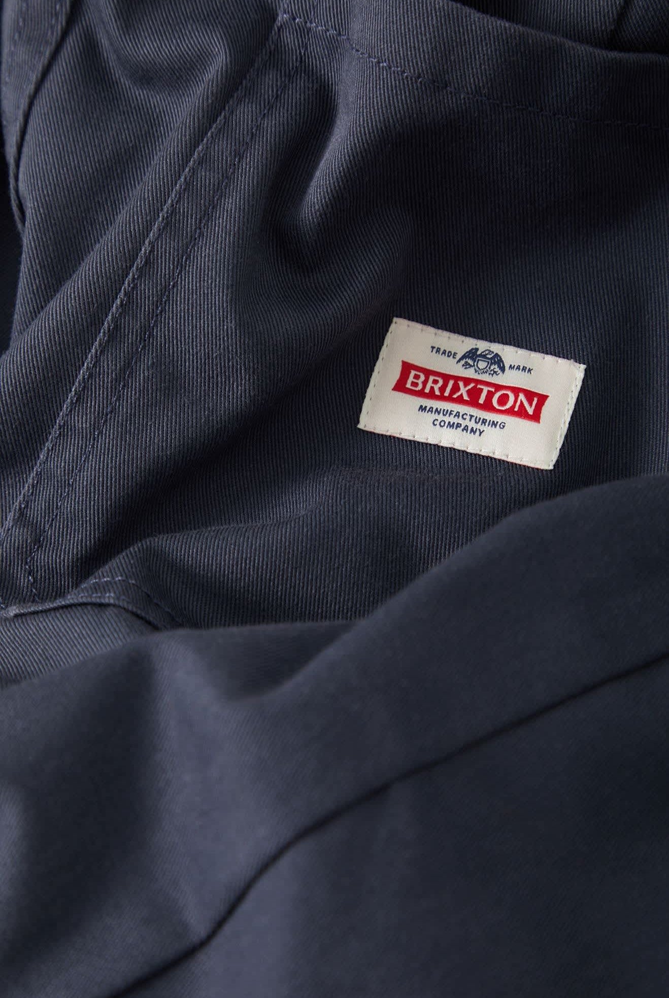 Men's Trademark Chino Pant in the color Washed Navy - Additional Laydown image