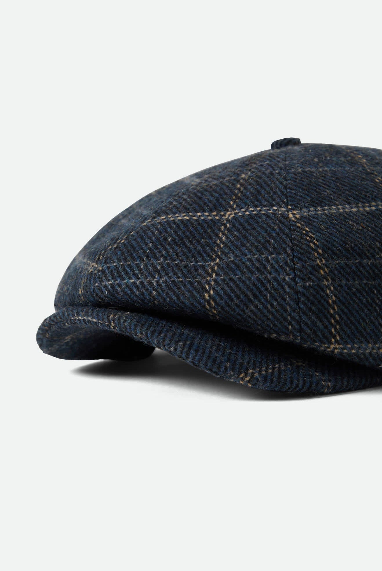 Unisex Brood Newsboy Cap in the color Mood Indigo/Tan - Additional Laydown image
