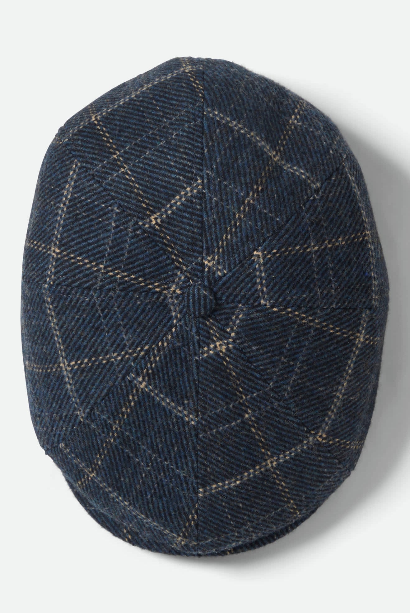 Unisex Brood Newsboy Cap in the color Mood Indigo/Tan - Additional Laydown image
