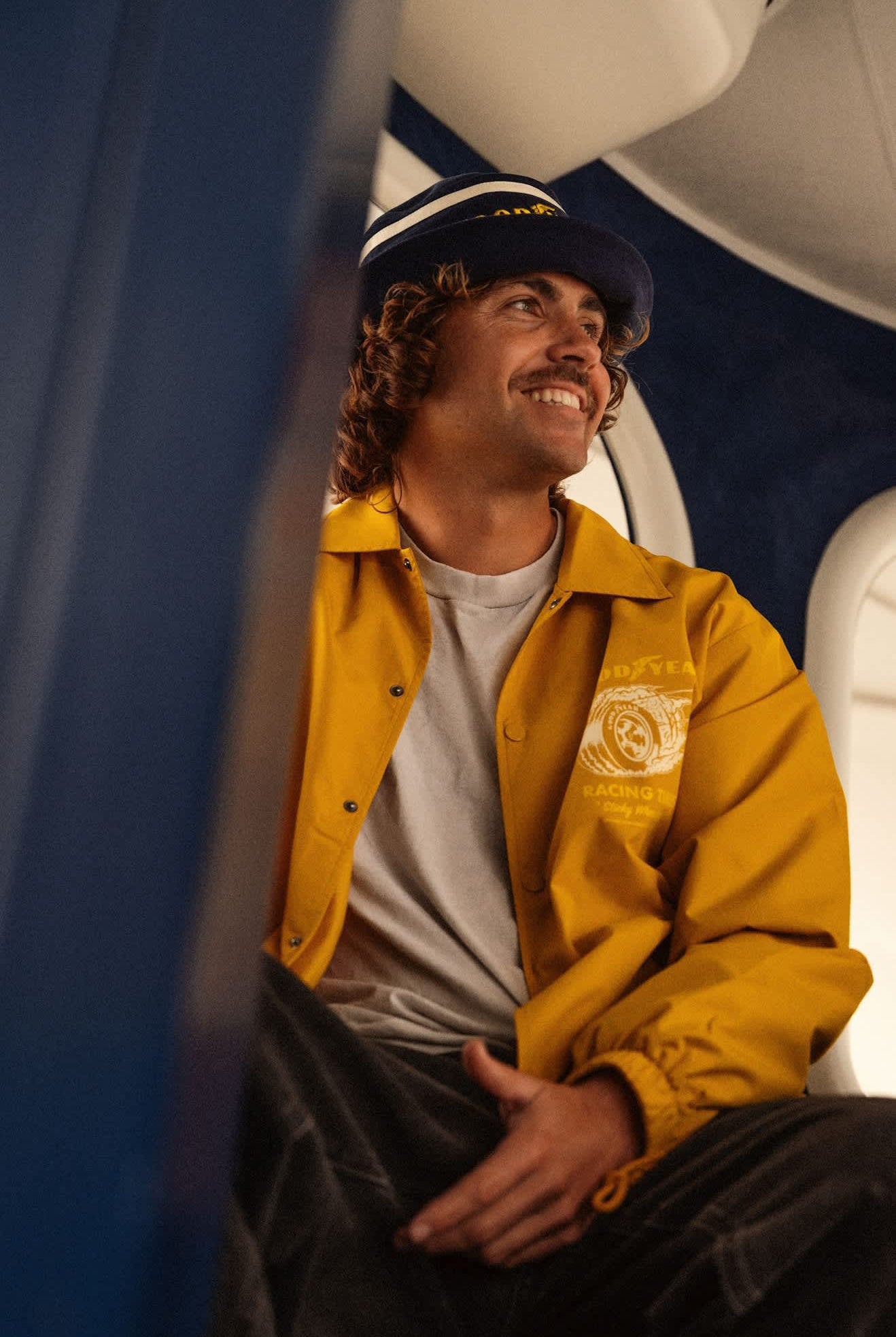 Men's Goodyear Slick Windbreaker in the color Nugget Gold - Men's Lifestyle image