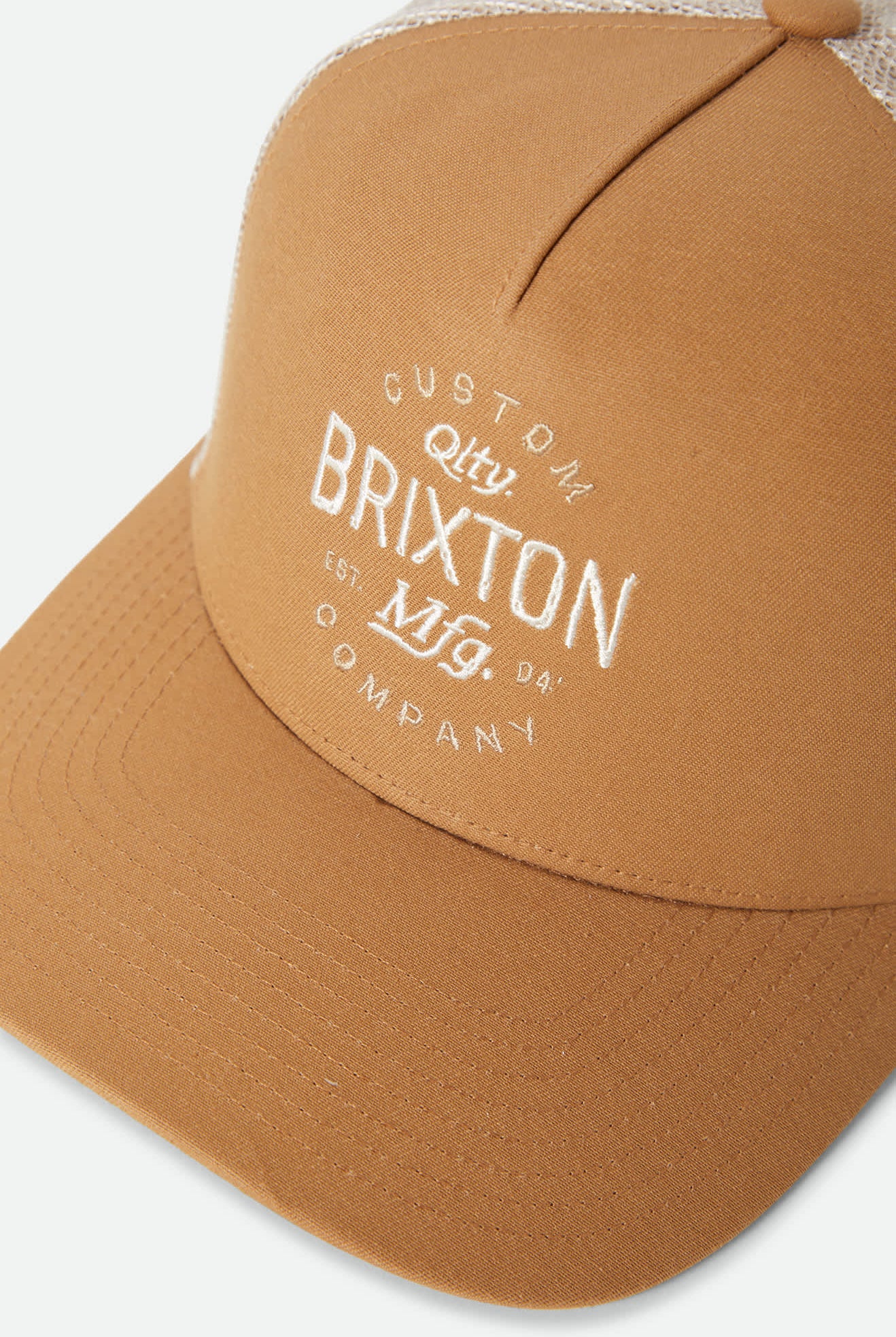 Unisex Fremont Netplus Trucker Hat in the color Copper/Sand - Additional Laydown image