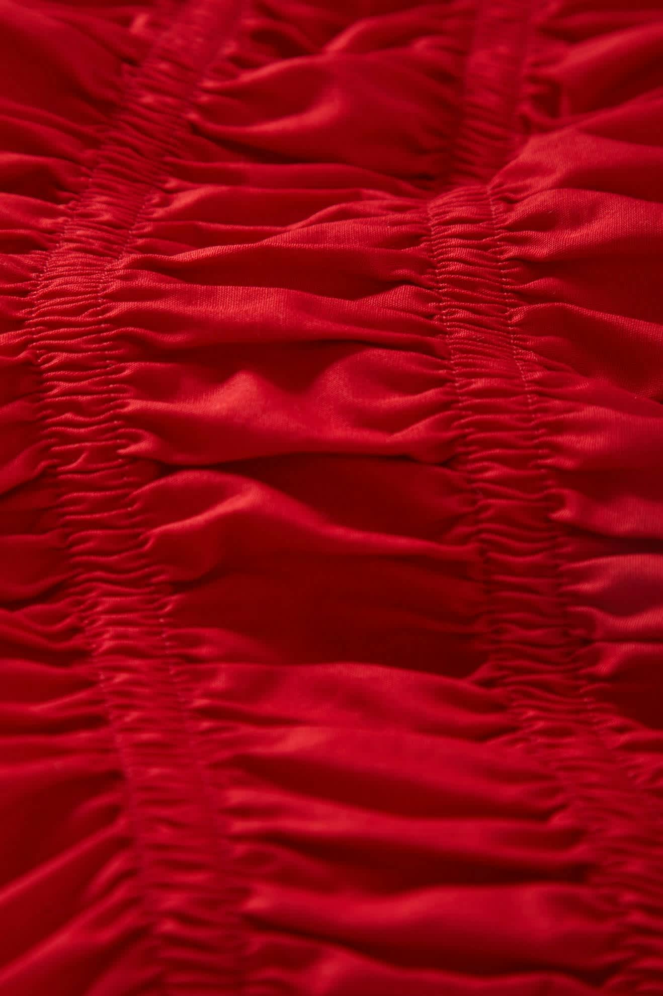 Women's Eden Smocked Top in the color Crimson - Additional Laydown image