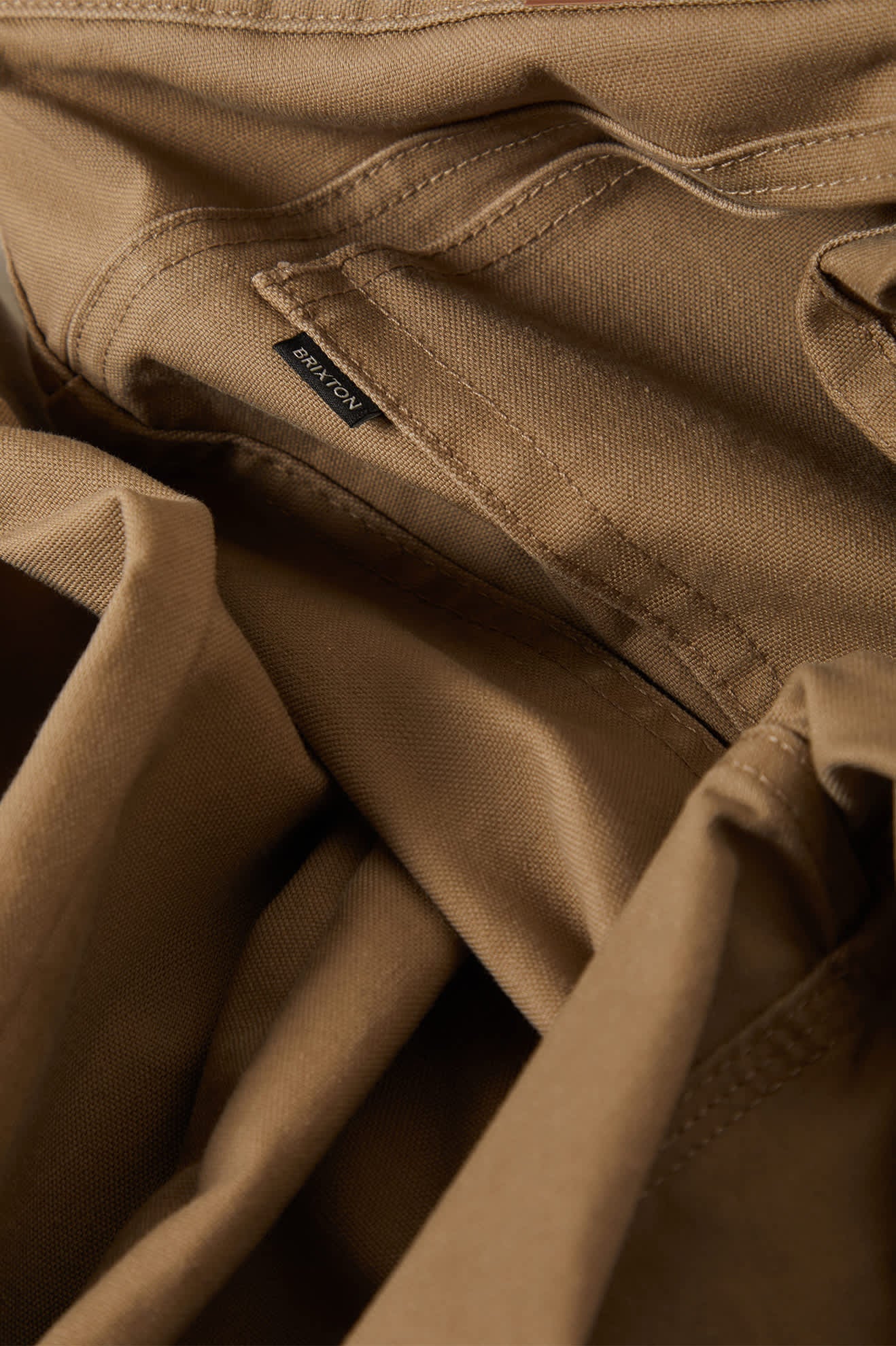 Men's Builders 5 Pocket Stretch Pant in the color Khaki - Additional Laydown image