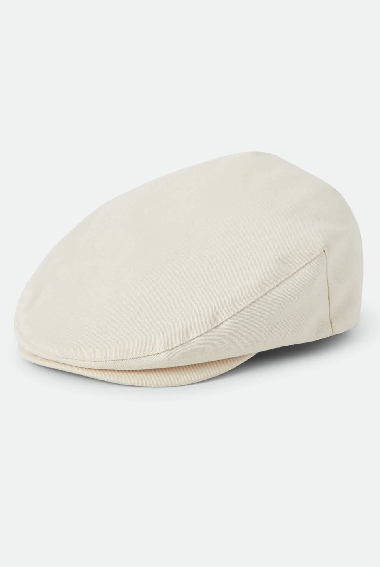 Unisex Hooligan Flat Cap in the color Egret White - Front Product Laydown Image