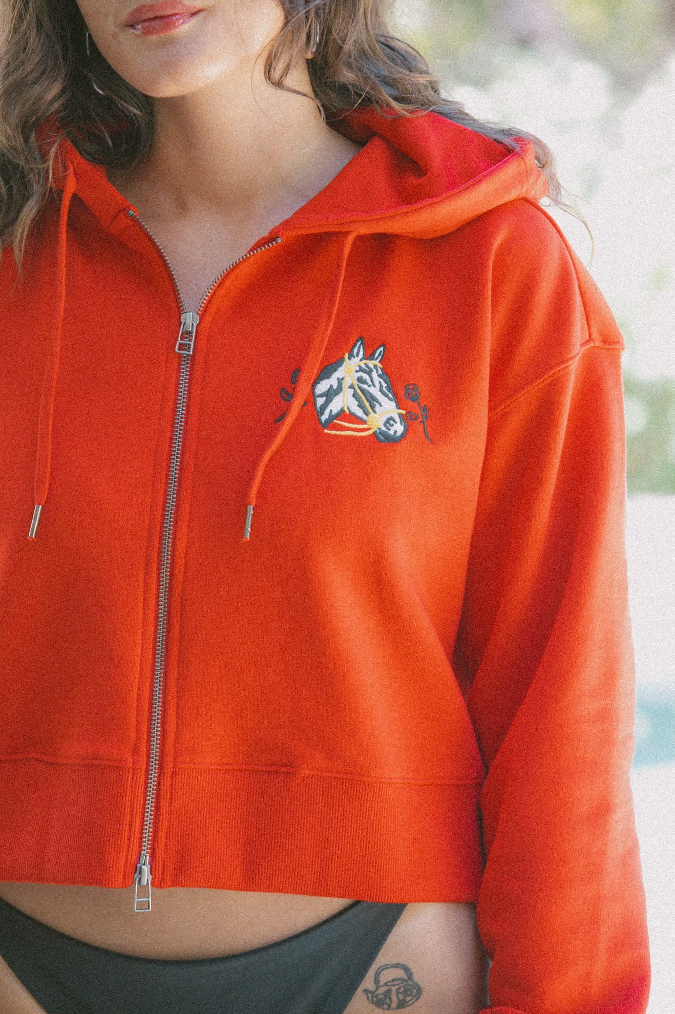 Women's Trophy Horse Cropped Zip Hood in the color Adrenaline Rush - Women's Lifestyle image
