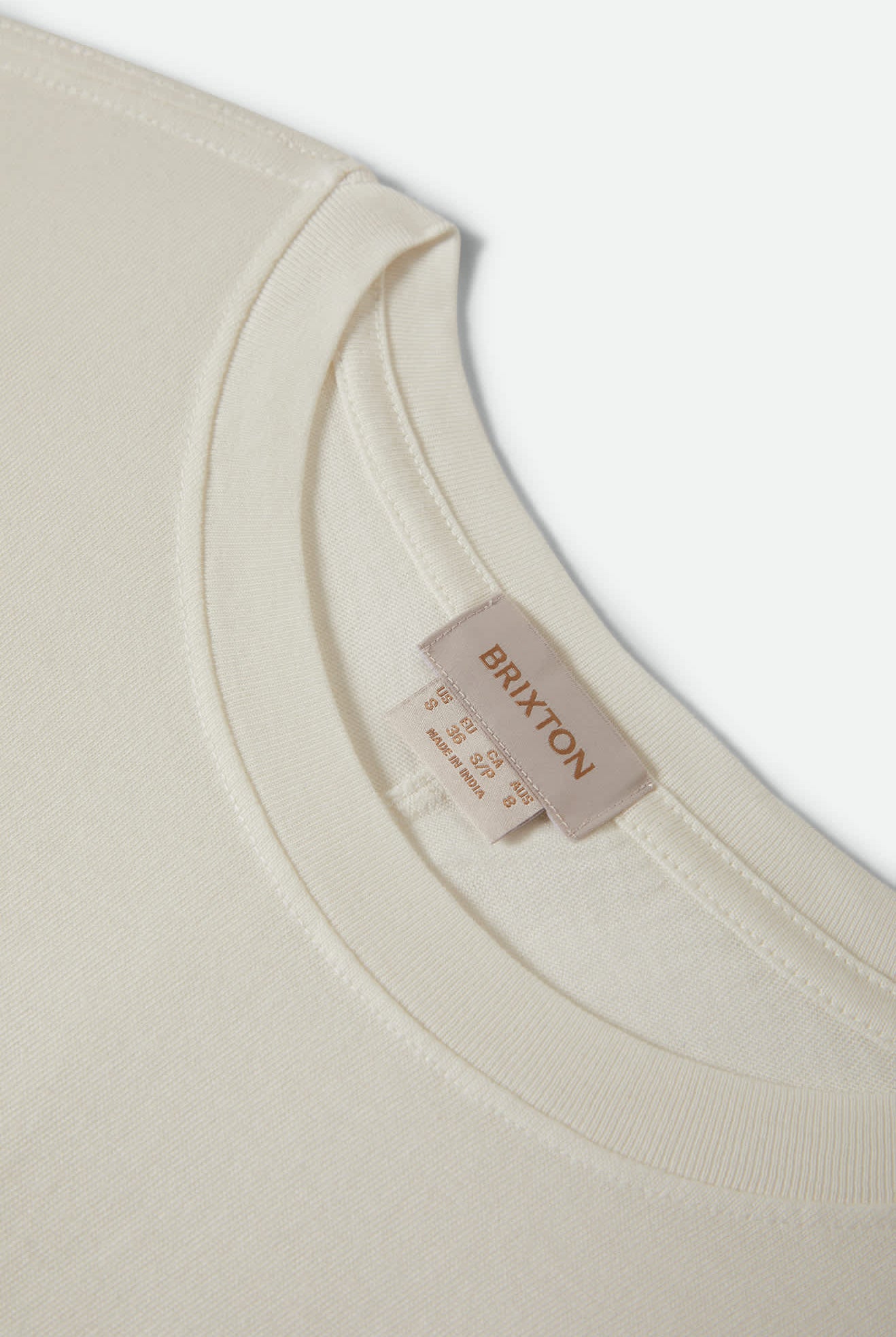 Women's Carefree Organic Garment Dye Cinch T-Shirt in the color Off White - Additional Laydown image
