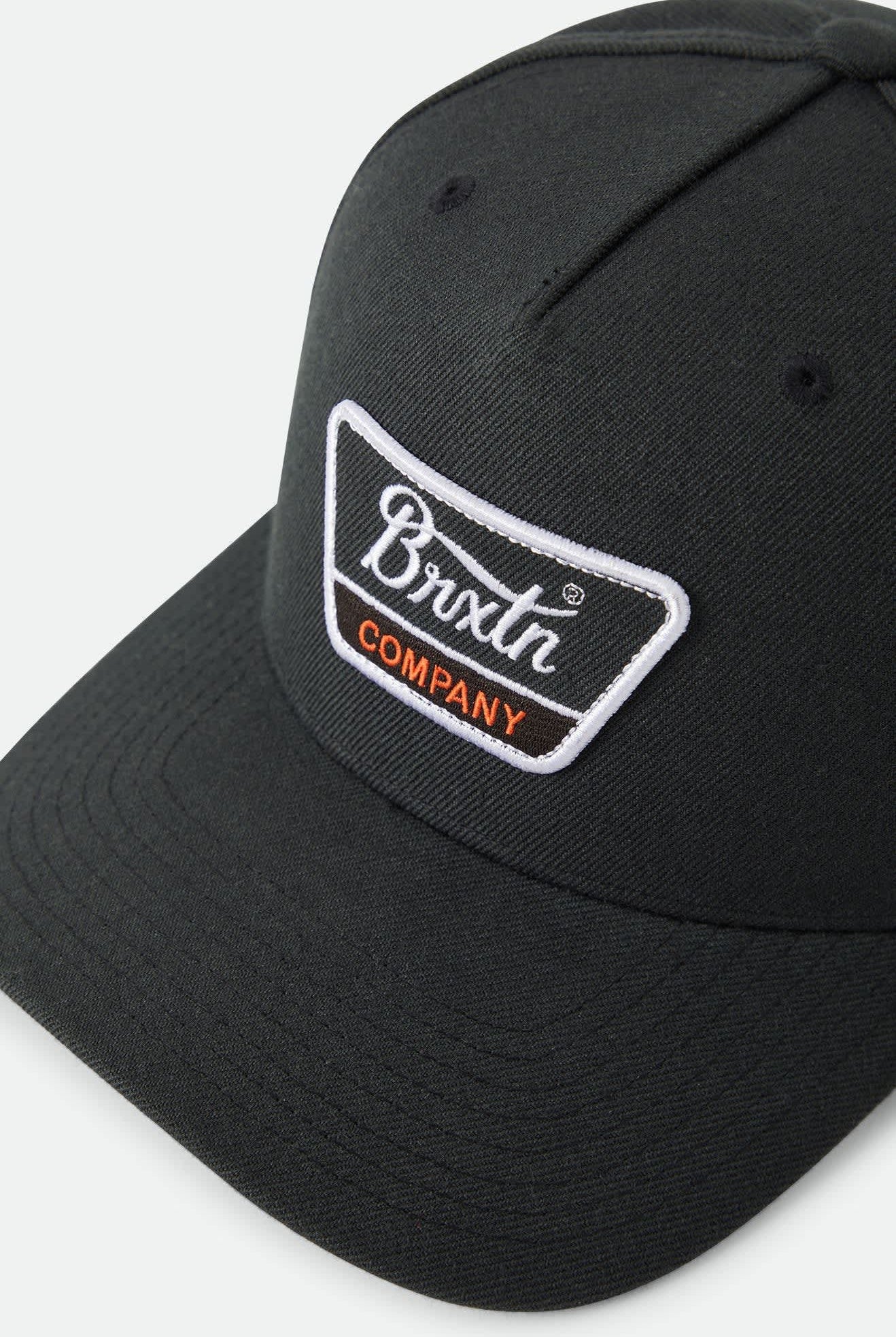 Unisex Linwood Netplus Snapback in the color Black/Orange/White - Additional Laydown image