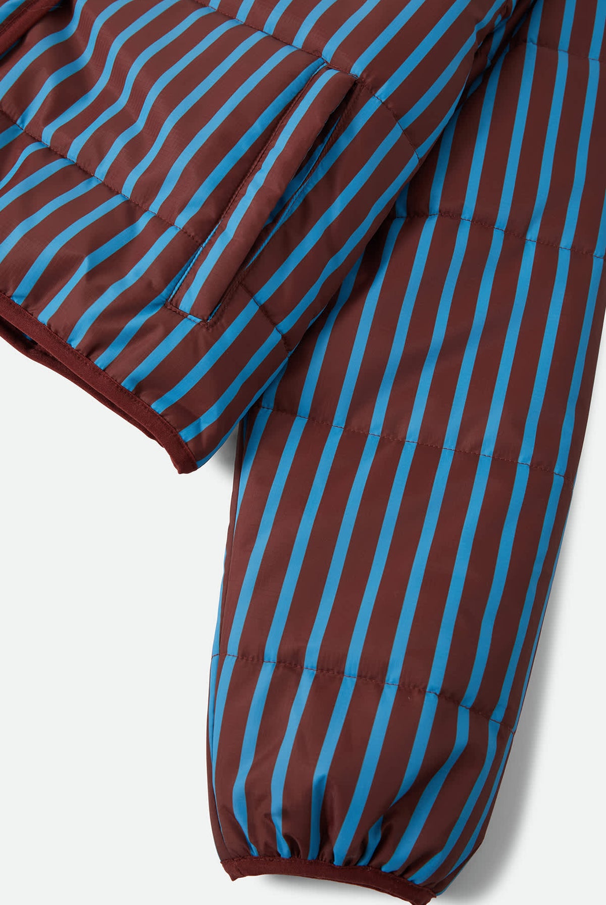 Women's Delilah Mock Neck Jacket in the color Dark Brick/Electric Indigo Stripe - Additional Laydown image