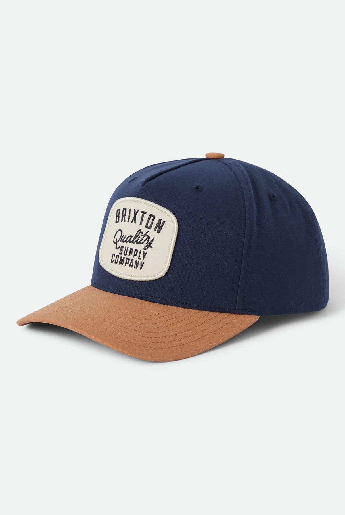 Unisex Hubal Snapback in the color Washed Navy/Dusted Ochre - Front Product Laydown Image