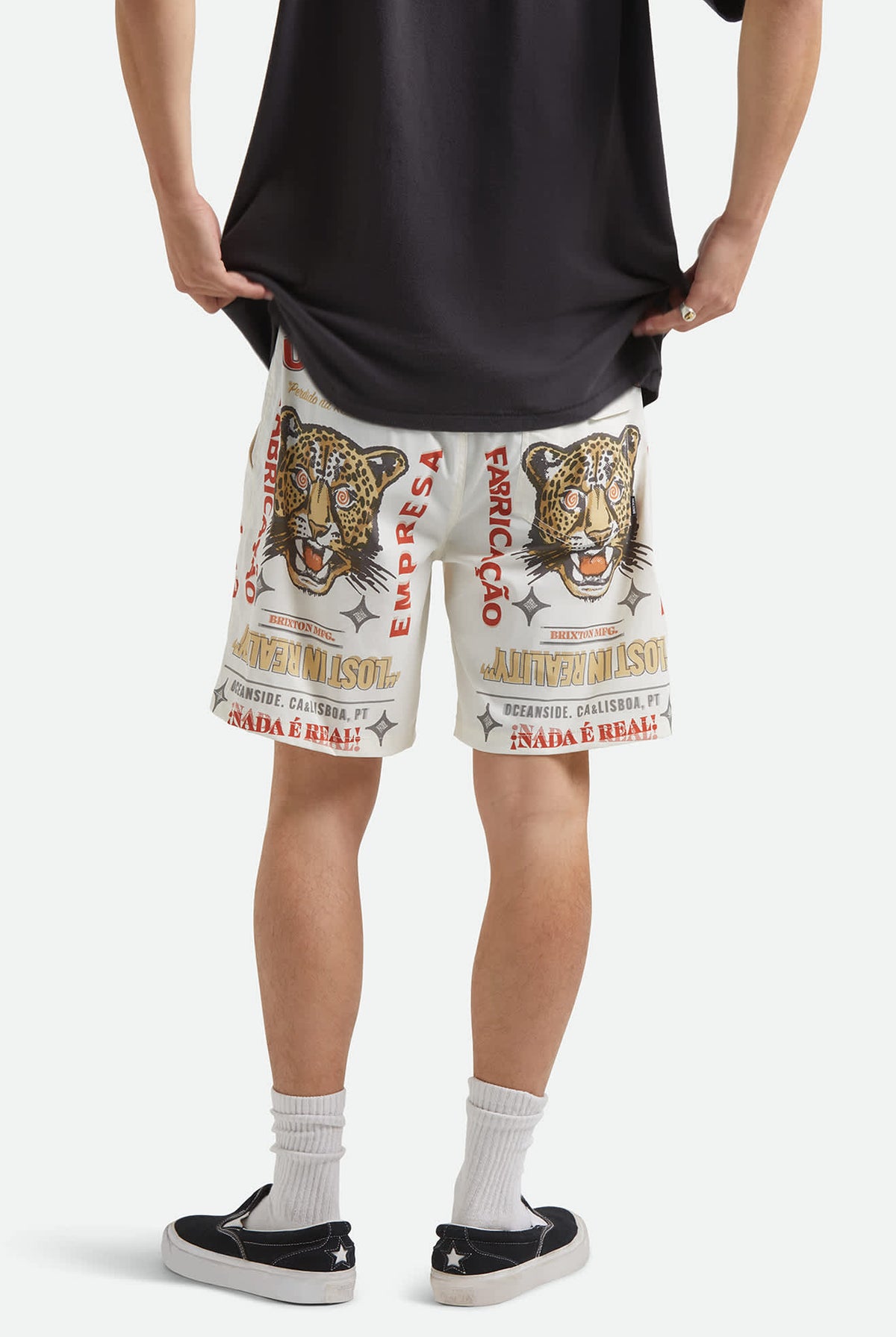 Men's Everyday Stretch Hybrid Short 7" in the color Lost In Reality - Men's Back View