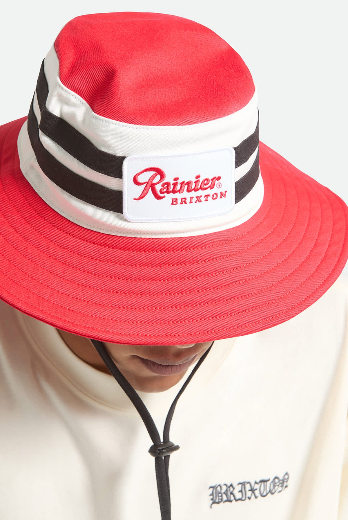 Unisex Rainier X Brixton Boonie in the color Natural/Red - Additional Fit image