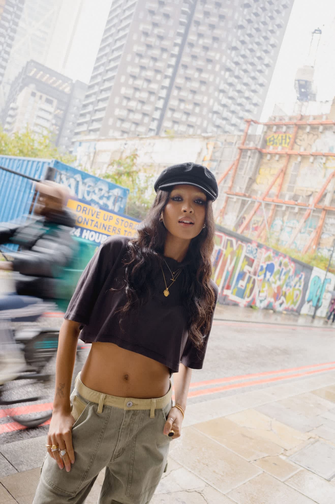 Women's Carefree Organic Garment Dye Cropped Henley in the color Black - Women's Lifestyle 1