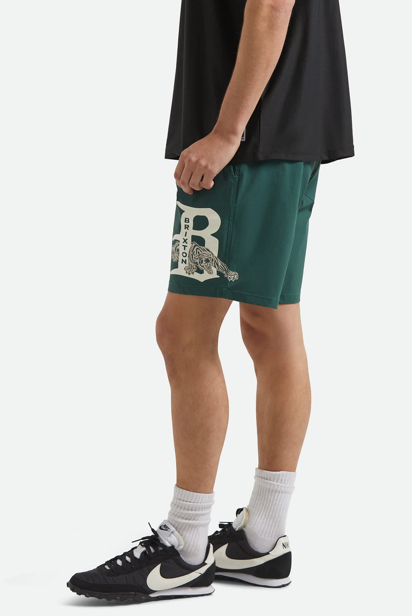 Men's Everyday Stretch Hybrid Short 7" in the color Primal Green - Men's Side View