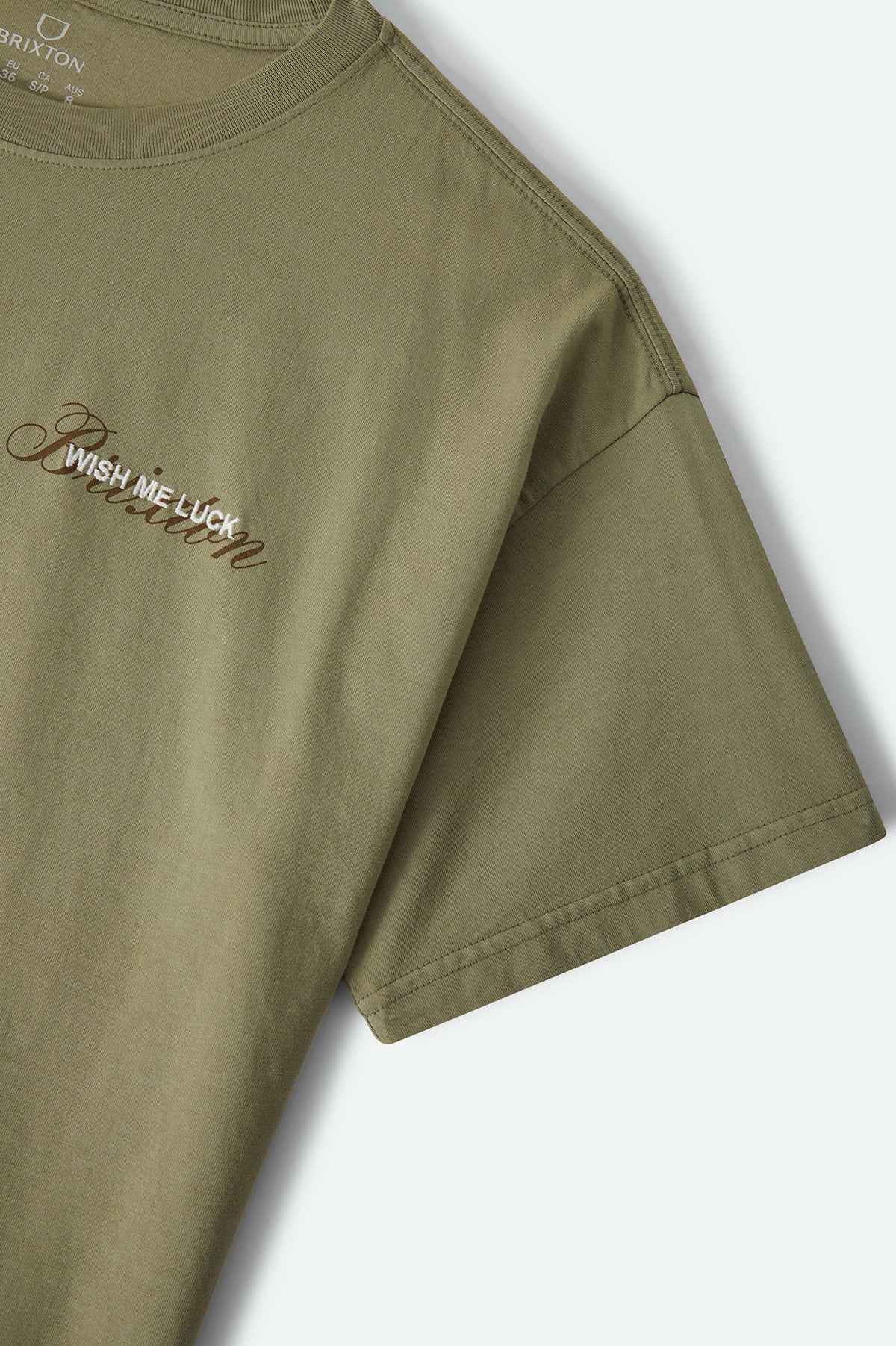 Women's Wish Me Luck Boxy Crop T-Shirt in the color Olive Surplus - Additional Laydown image