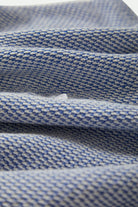 Women's The Weekend Cross Loop French Terry Top in the color Off White/Electric Indigo - Additional Laydown image