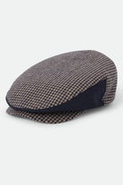 Unisex Hooligan Flat Cap in the color Navy/Sand Houndstooth - Front Product Laydown Image