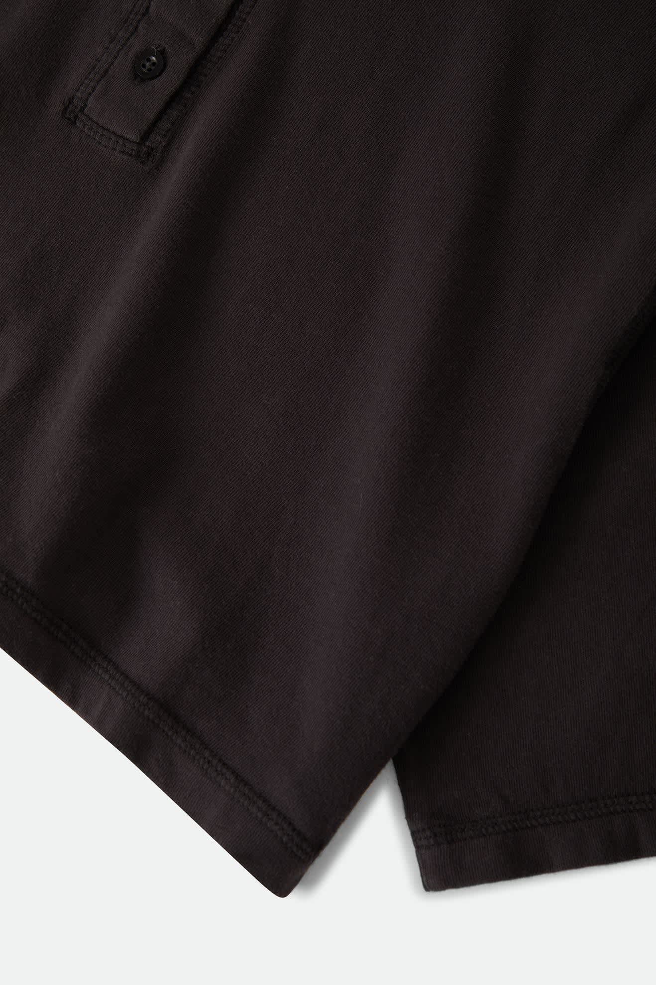 Women's Carefree Organic Garment Dye Cropped Henley in the color Black - Additional Laydown image