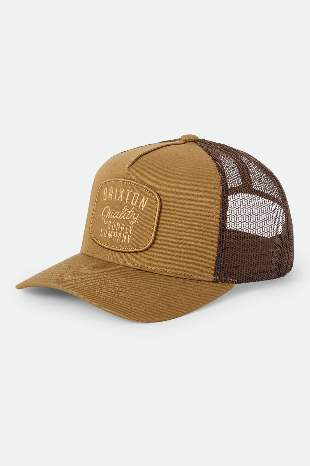 Unisex Hubal Trucker Hat in the color Dusted Ochre - Front Product Laydown Image