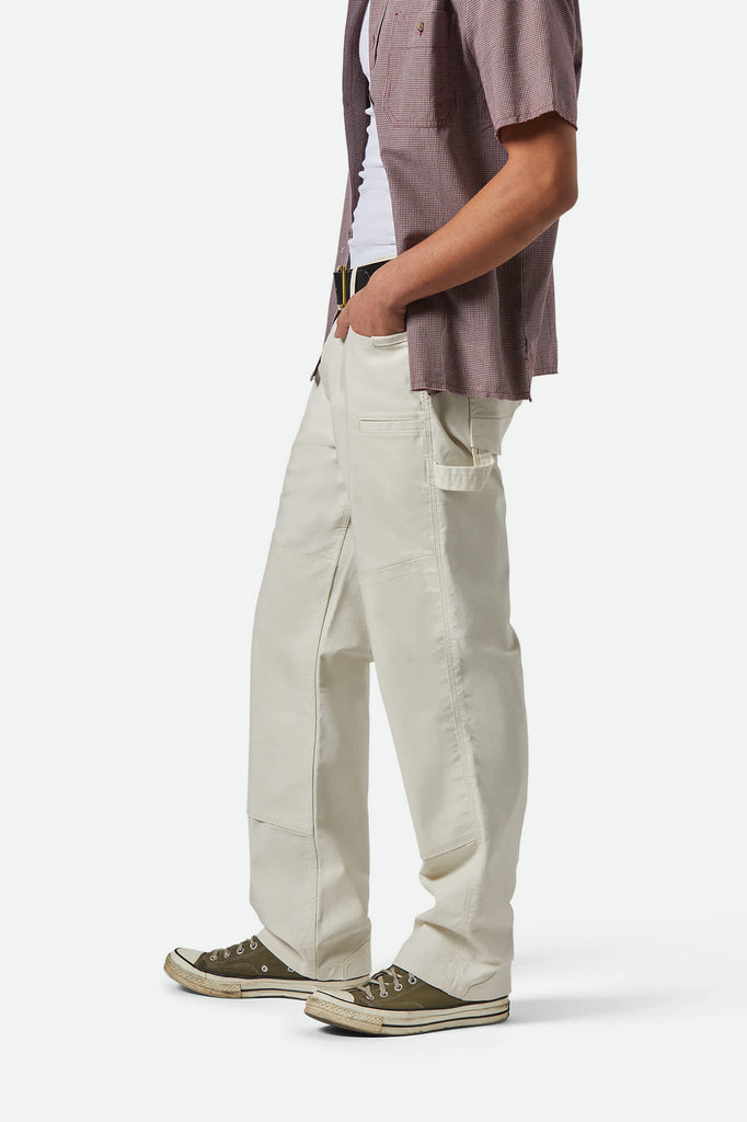 Men's Builders Carpenter Stretch Pant in the color Egret White - Men's Side View