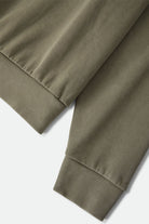 Men's Brixton Baseline Crew Fleece in the color Olive Surplus Vintage Wash - Additional Laydown image