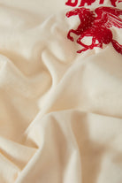 Women's Pegasus Slim Crew T-Shirt in the color Vintage White - Additional Laydown image