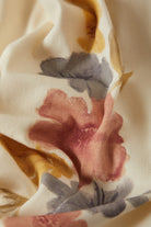 Women's The Chloe 5-Pocket Pant in the color Off White Floral Burst - Additional Laydown image