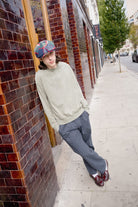 Unisex Barrel Earflap Snap Cap in the color Navy/Green/Red/Cream - Men's Lifestyle 4.0