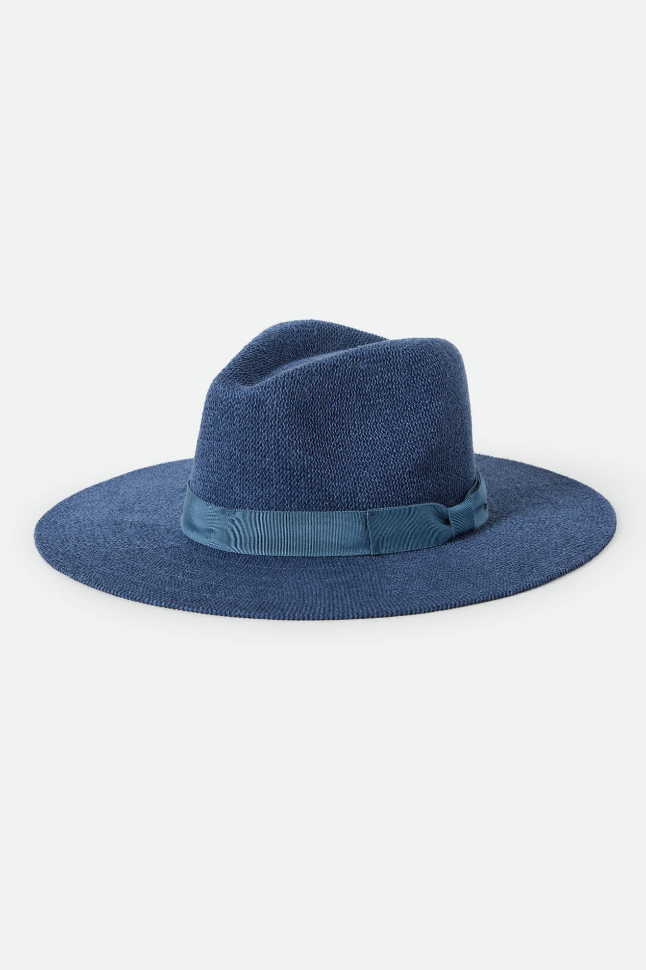 Women's Lyons Knit Packable Hat in the color Midnight Blue - Front Product Laydown Image
