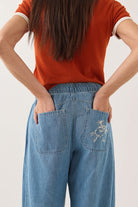 Women's Utility Everyday Barrel Pant in the color Light Stone Wash - Women's Back View