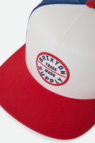 Unisex Oath Trucker Hat in the color White/Midnight Blue/Adrenaline Rush - Additional Laydown image