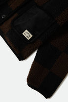 Women's Delilah Quilted Jacket in the color Black/Brown - Additional Laydown image