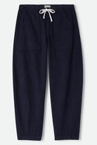Women's Utility Everyday Barrel Pant in the color Washed Navy - Front Product Laydown Image