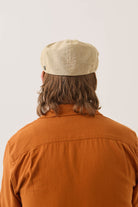 Unisex Brood Newsboy Cap in the color Khaki Stripe/Washed Black - Men's Back View