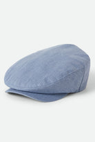 Unisex Barrel Alpha Snap Cap in the color Light Stone Wash Denim - Front Product Laydown Image