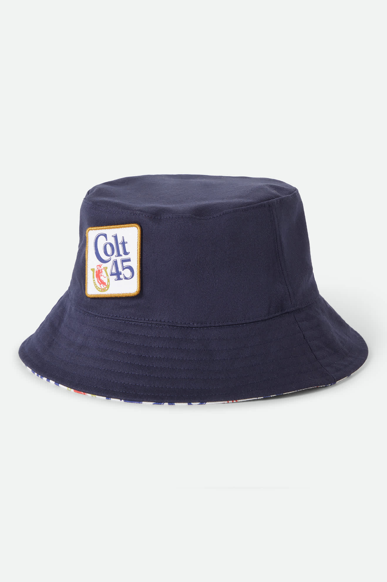 Unisex Colt 45 X Brixton Bucket Hat in the color Multi/Midnight Blue - Front Product Laydown Image