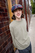 Unisex Barrel Earflap Snap Cap in the color Navy/Green/Red/Cream - Men's Lifestyle 3.0