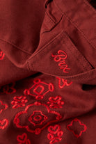 Women's Essex Embroidered Painter Pant in the color Dark Brick - Additional Laydown image