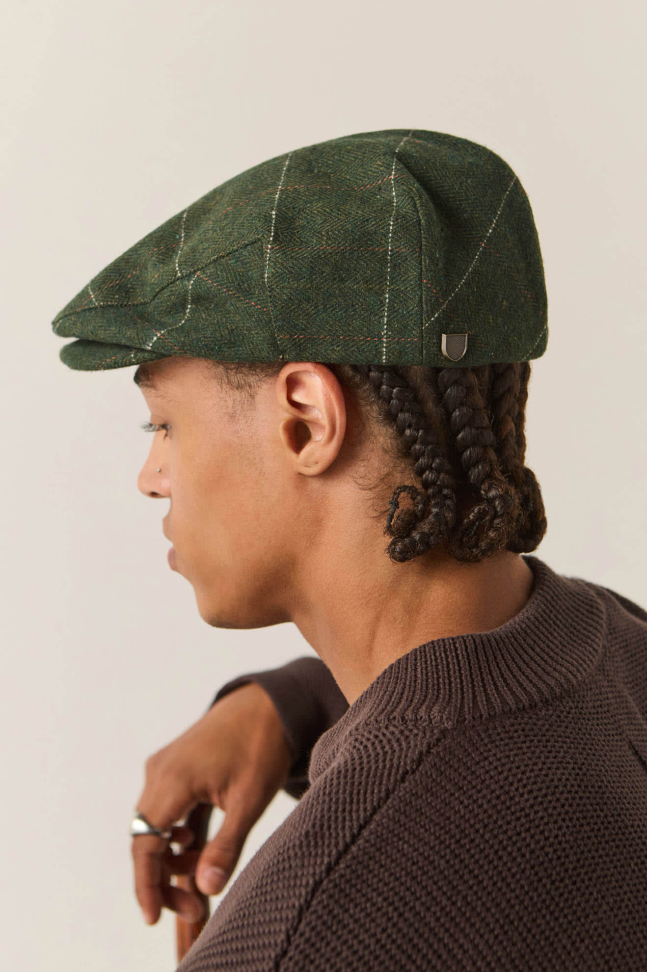 Unisex Hooligan Flat Cap in the color Moss/Orange - Men's Back View