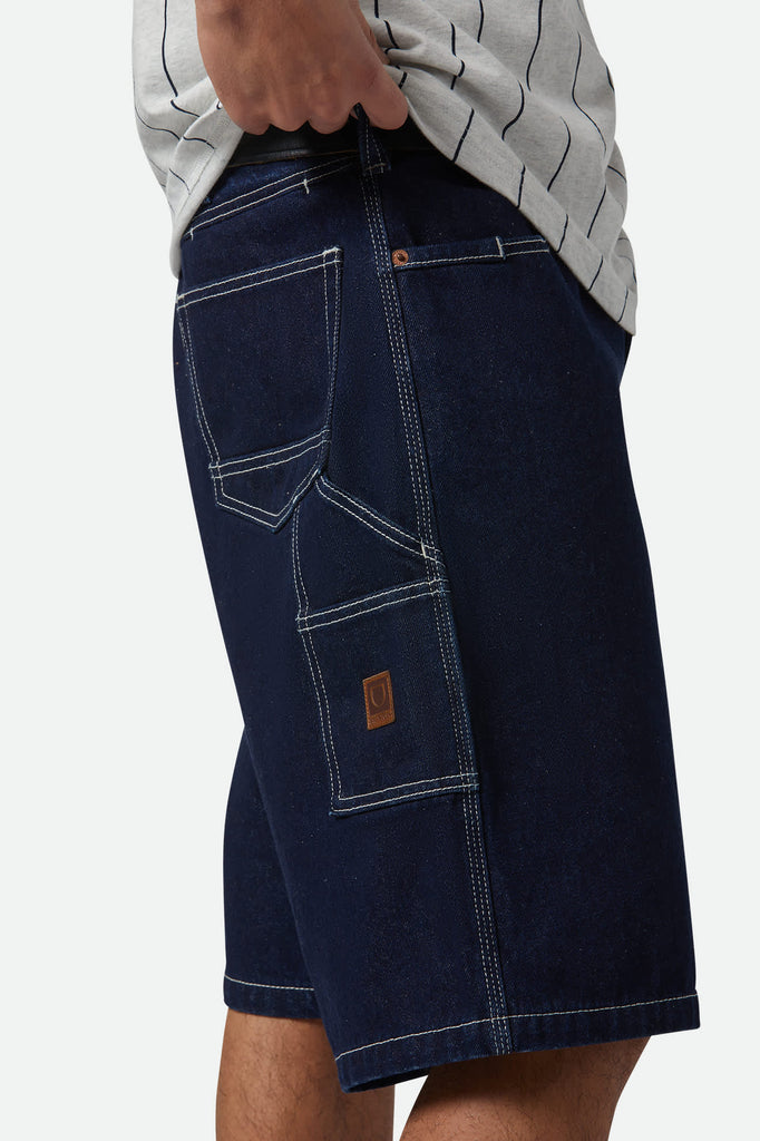 Men's Builders Carpenter Baggy Short in the color Rinse Denim - Men's Side View