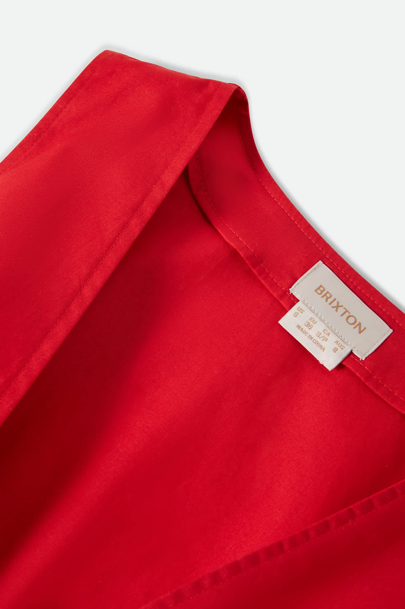 Women's The Bells Top in the color Adrenaline Rush - Additional Laydown image