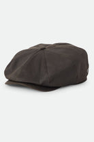 Unisex Brood Baggy Flannel Snap Cap in the color Brown Faux Leather - Front Product Laydown Image