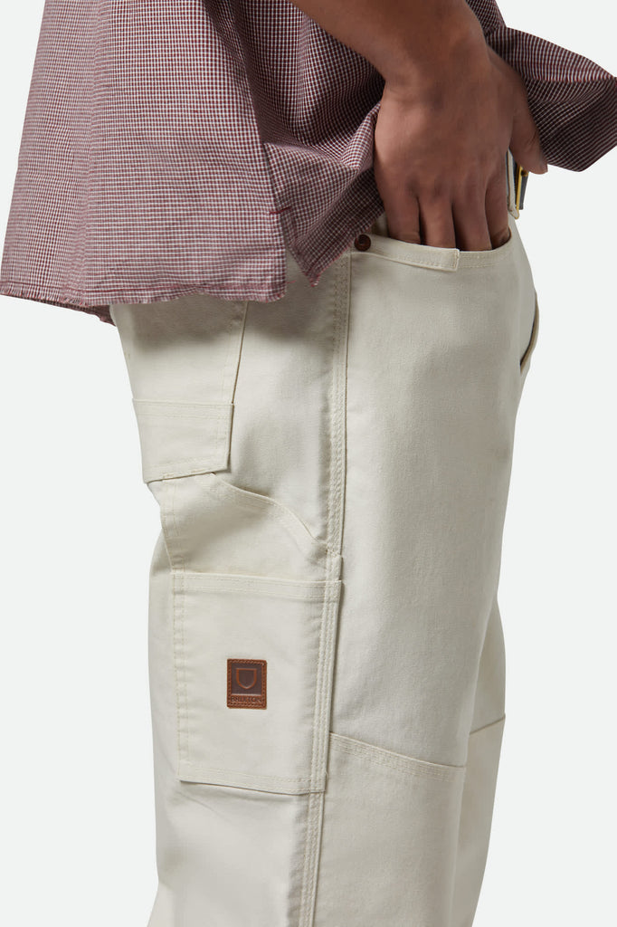 Men's Builders Carpenter Stretch Pant in the color Egret White - Additional Fit View